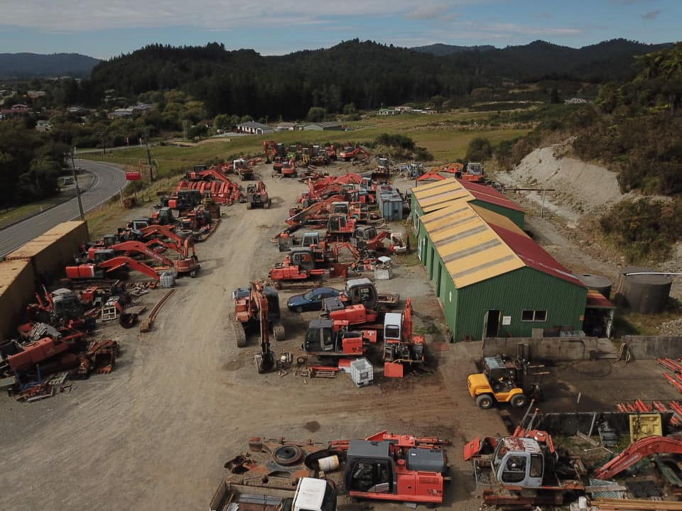 Dismantled excavator parts